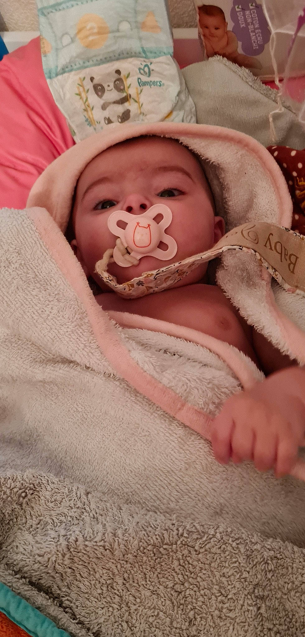 Jennah participe au concours pour gagner de l'argent avec cette photo : baby, baby_sleeping, baby_toddler_clothing, bedding, cheek, child, comfort, happy, headgear, human_body, linens, lip, mouth, neck, nose, peach, person, pink, skin, textile