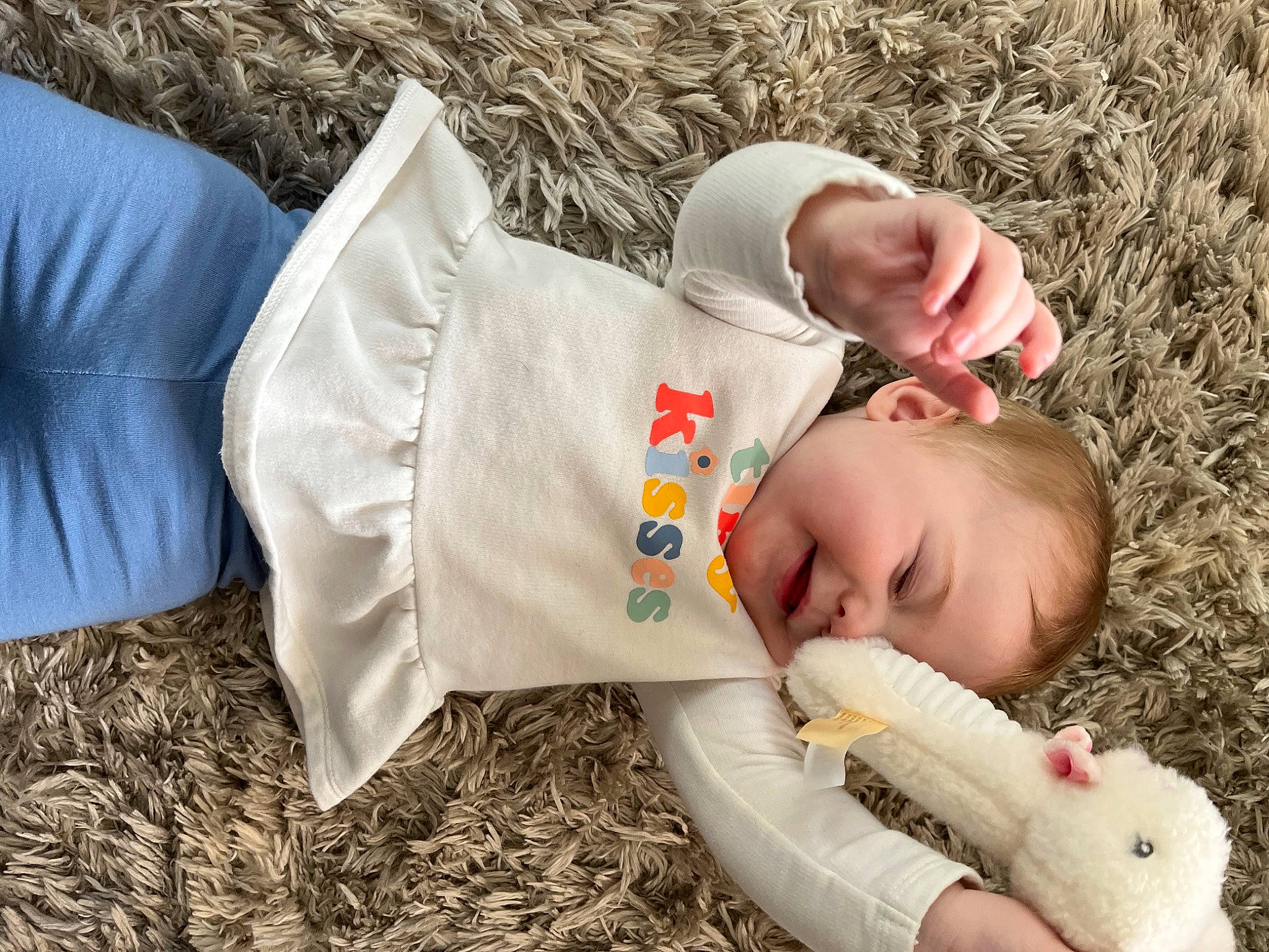 Aislyn joined the competition — help win amazing prizes! baby, baby_toddler_clothing, child, comfort, face, finger, fur, grass, grass_family, hand, happy, head, human_body, linens, people_in_nature, person, sitting, skin, toddler, tree