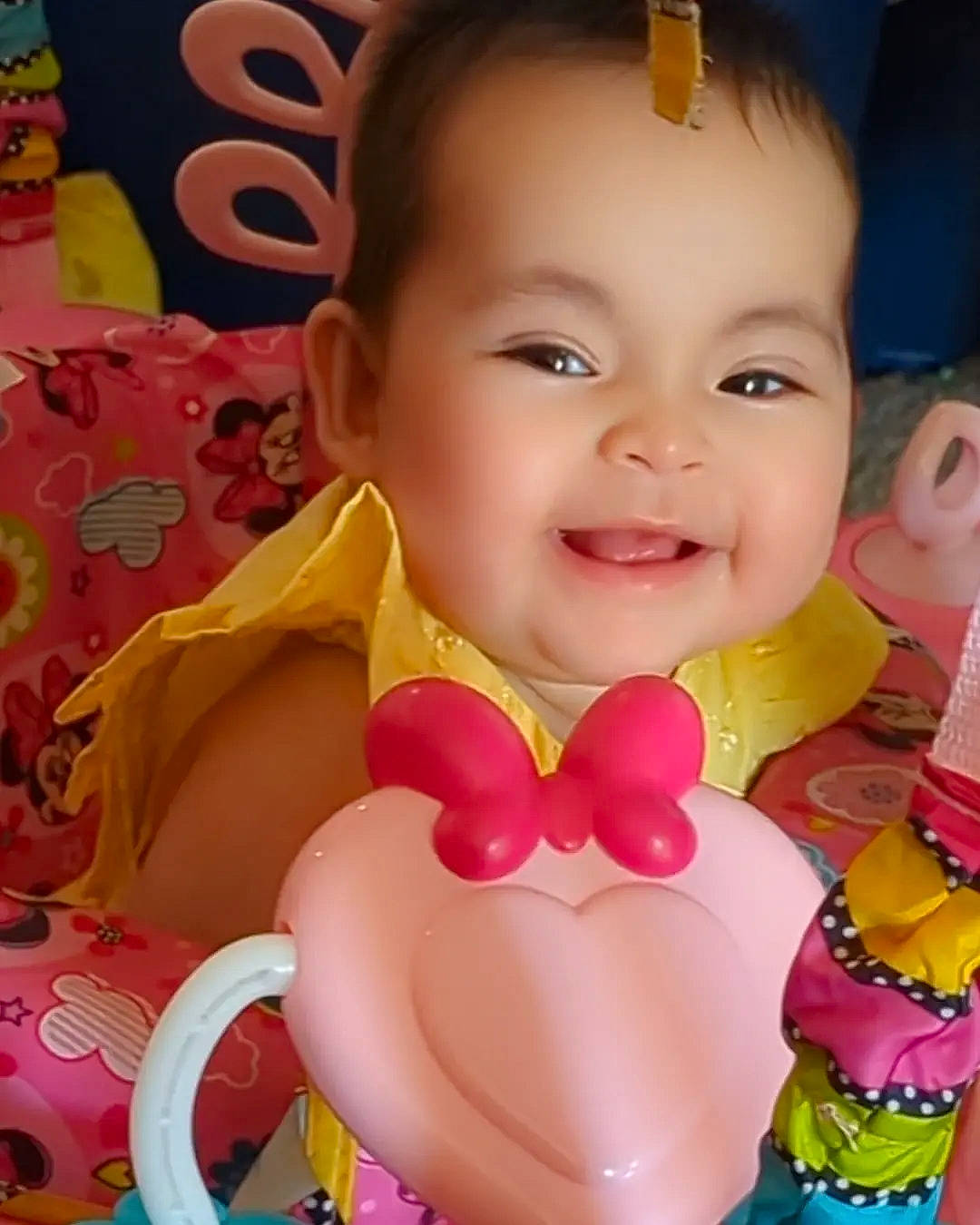 Esperanza joined the competition — help win amazing prizes! baby, baby_playing_with_toys, baby_products, baby_toddler_clothing, balloon, cheek, child, chin, face, fun, happy, headgear, joy, magenta, nose, pattern, person, pink, play, skin