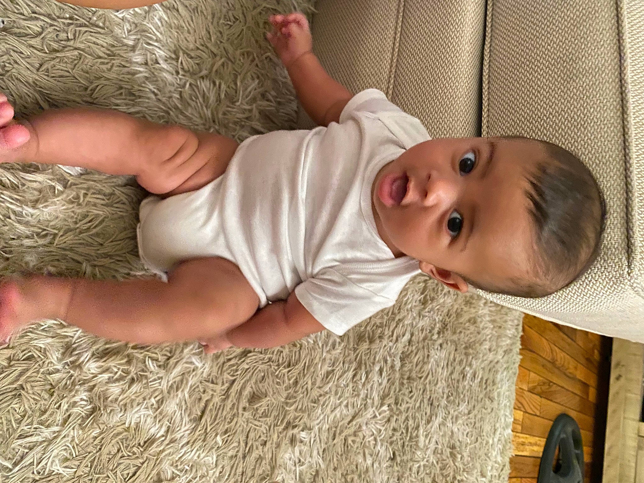 Cairo joined the competition — help win amazing prizes! baby, baby_toddler_clothing, comfort, eye, finger, flooring, fun, grass, hair, human_body, human_leg, infant_bed, mammal, mouth, nose, person, skin, smile, surprise, toddler