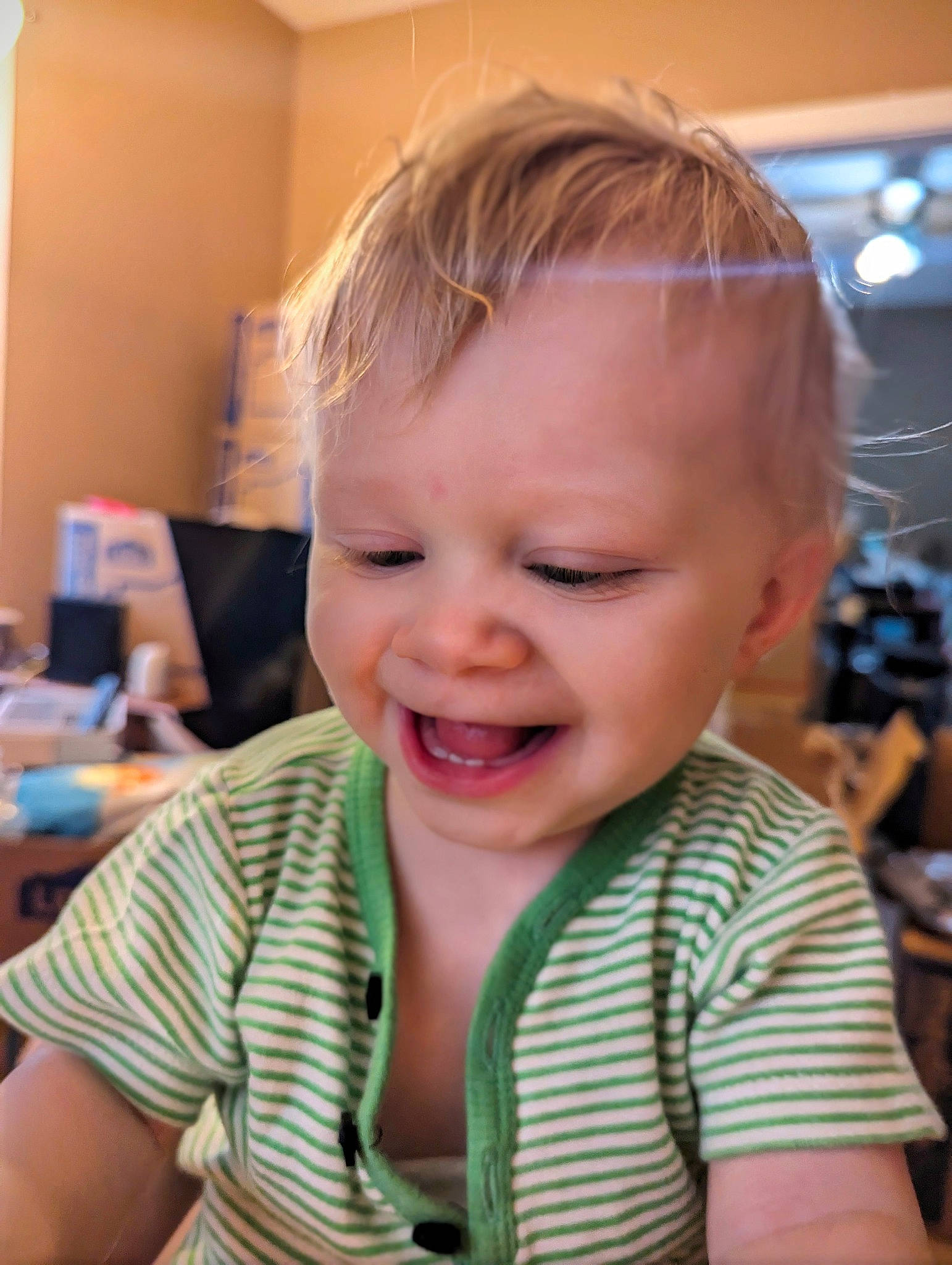 Malcolm is registered to the contest to win money with this photo: baby, baby_toddler_clothing, blond, chair, cheek, child, chin, ear, eyelash, fun, happy, iris, laugh, lip, mouth, nose, person, skin, smile, toddler