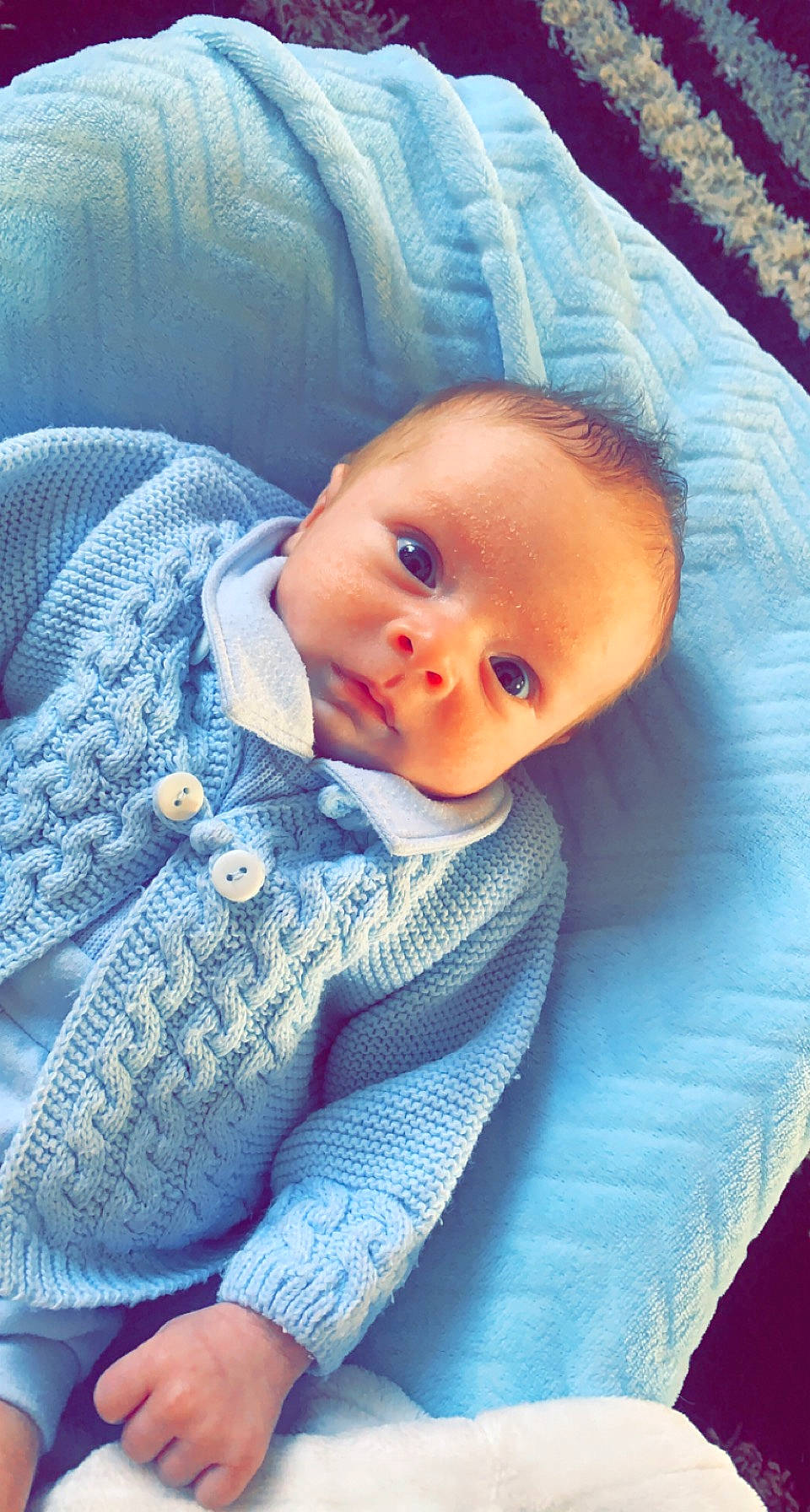 Brodie joined the competition — help win amazing prizes! azure, baby, baby_products, baby_toddler_clothing, blue, cheek, collar, comfort, electric_blue, eye, grey, head, iris, linens, nose, person, product, skin, sleeve, textile