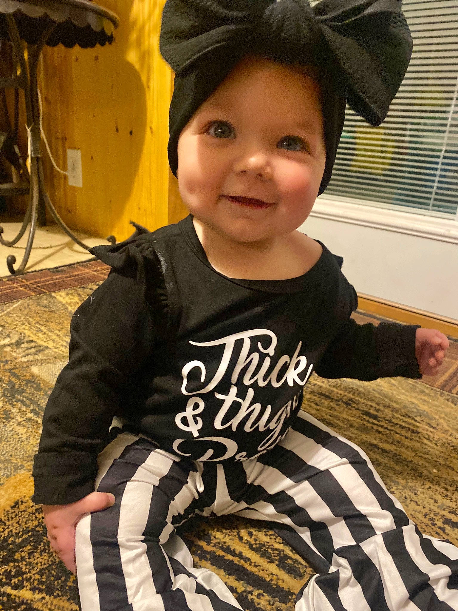 Emberleigh is registered to the contest to win money with this photo: baby_toddler_clothing, black, cool, eye, eyewear, facial_expression, fun, hairstyle, happy, headgear, joy, light, person, sleeve, smile, sportswear, street_fashion, t_shirt, tints_and_shades, tire