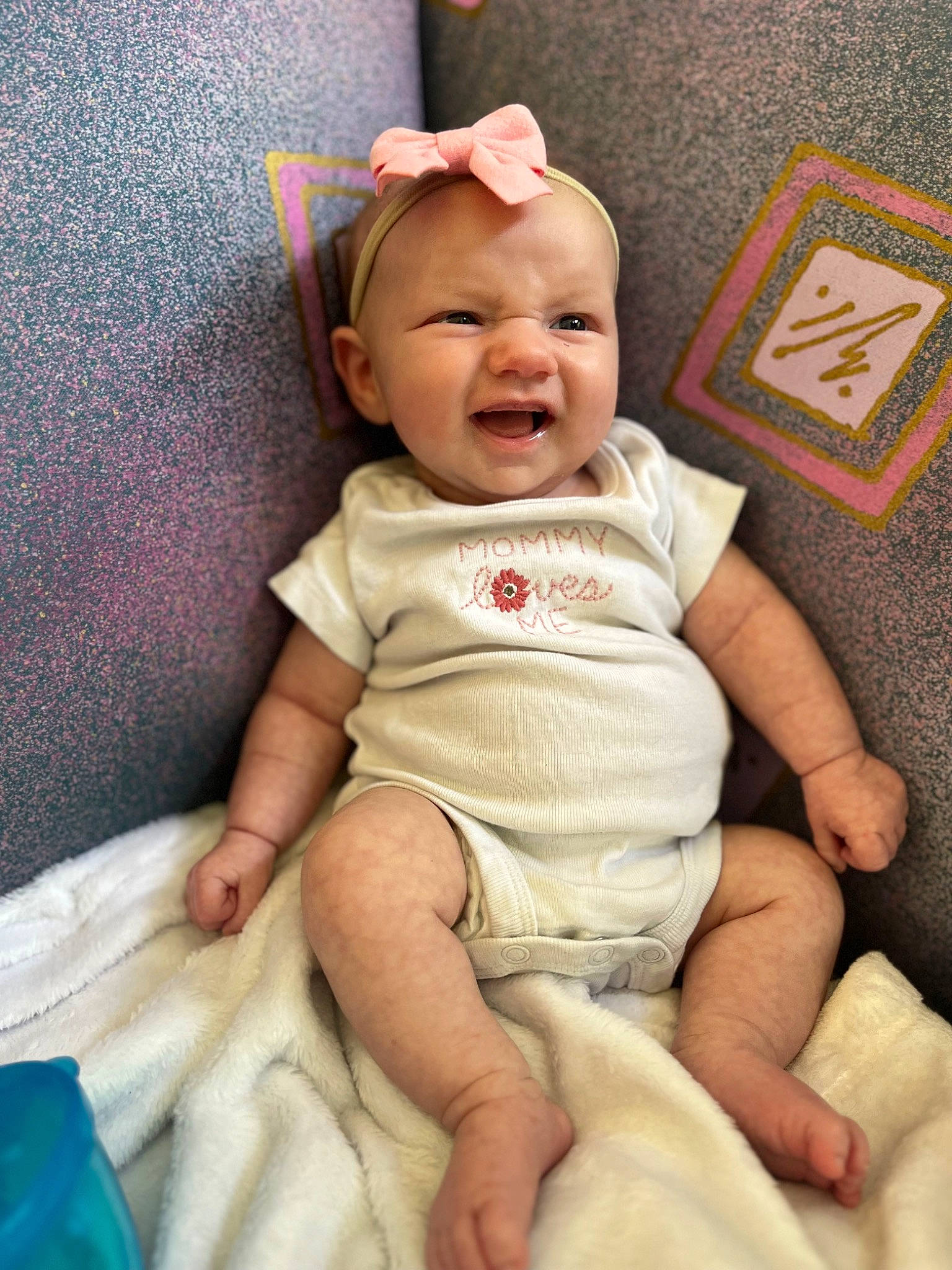 Jolene is registered to the contest to win money with this photo: arm, baby, baby_toddler_clothing, cheek, child, chin, comfort, dress, eye, finger, fun, happy, head, person, pink, skin, sleeve, smile, t_shirt, textile