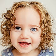 Raylynn joined the competition — help win amazing prizes! toddler, child, smiling, curly_hair, blue_eyes, portrait, close_up, face, happy, innocence, cute, baby, human, person, expression, young, headshot, studio, light_background, skin