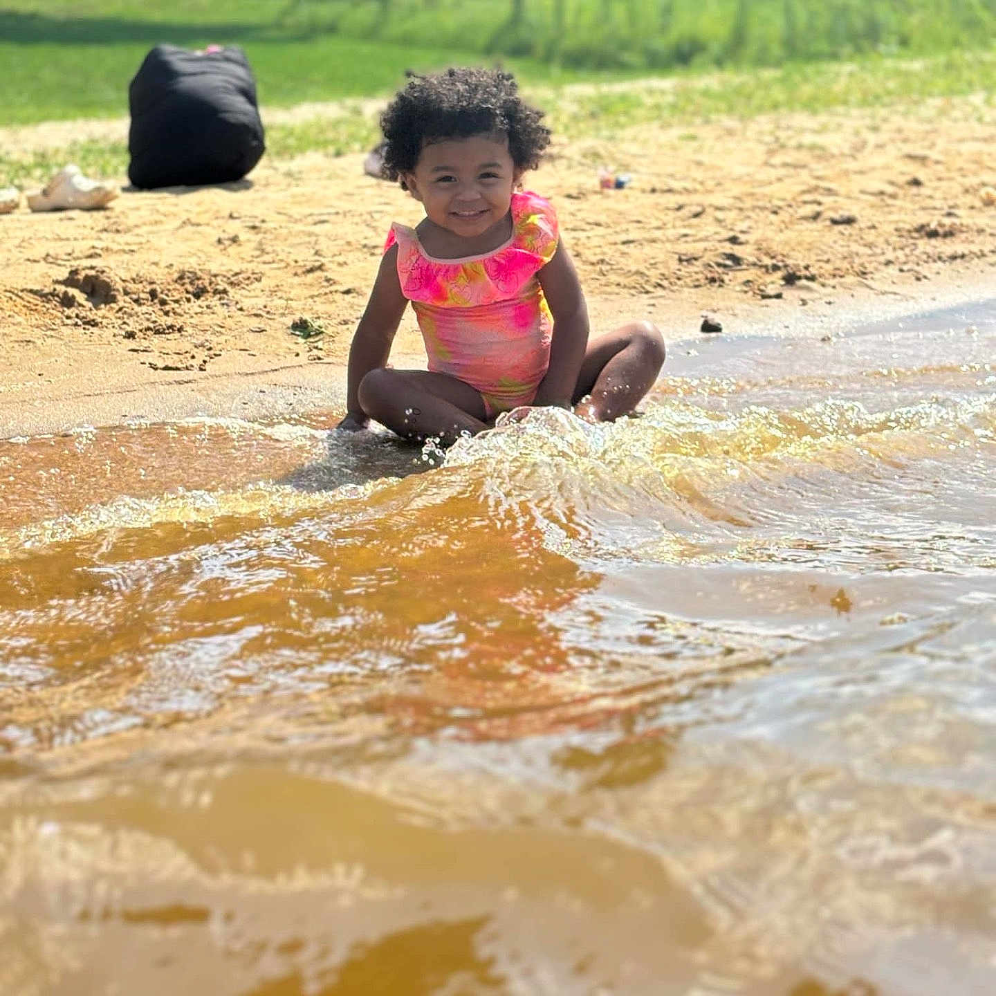 Angela joined the competition — help win amazing prizes! accessories, bag, bathing, beach, child, face, female, girl, hair, handbag, head, nature, outdoors, person, photography, portrait, sea, sitting, summer, water