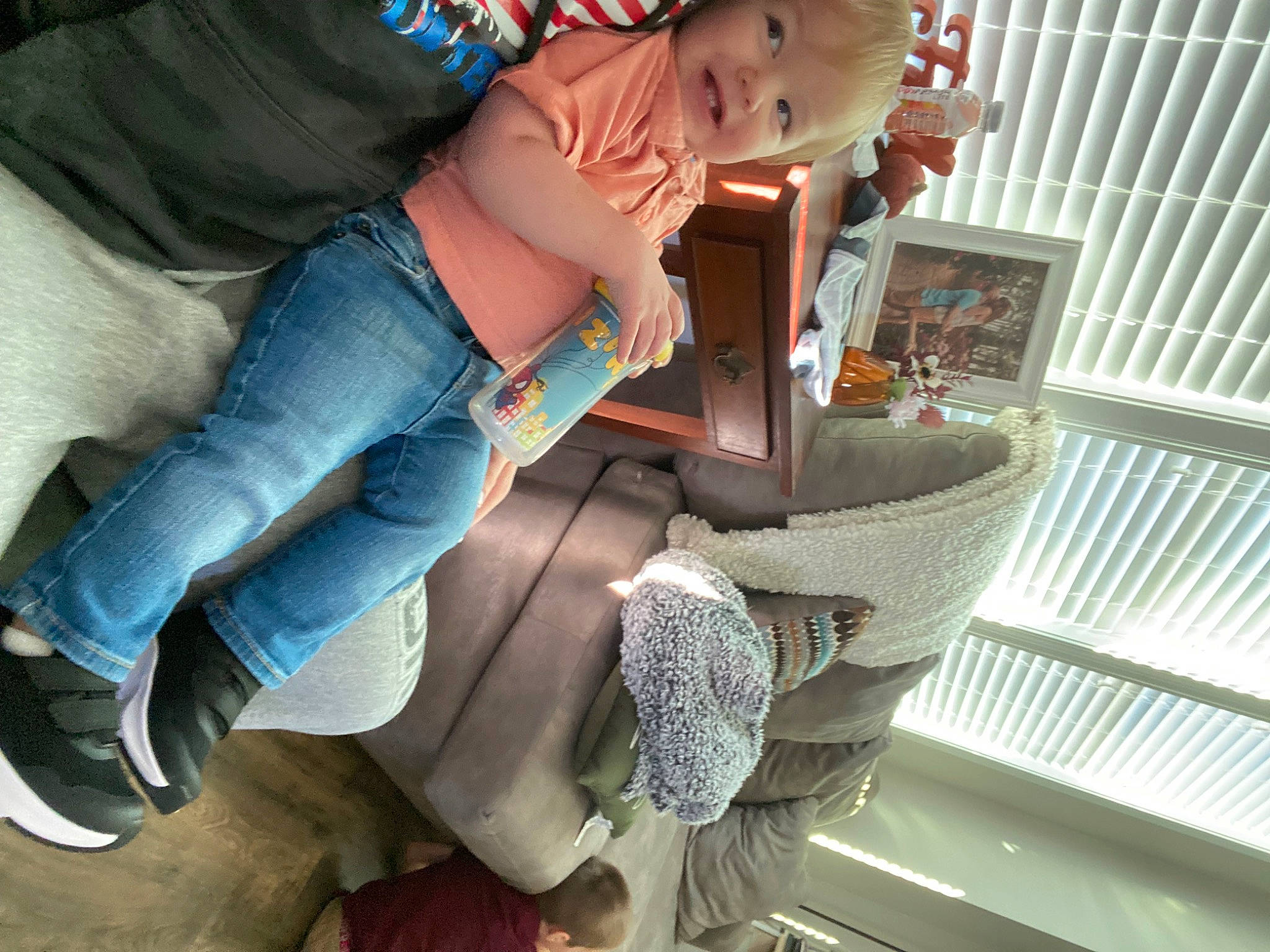 Cash is registered to the contest to win money with this photo: abdomen, baby, chair, comfort, denim, elbow, electric_blue, fashion_accessory, fun, human_leg, jeans, joy, knee, lap, pattern, person, sitting, thigh, toddler, waist