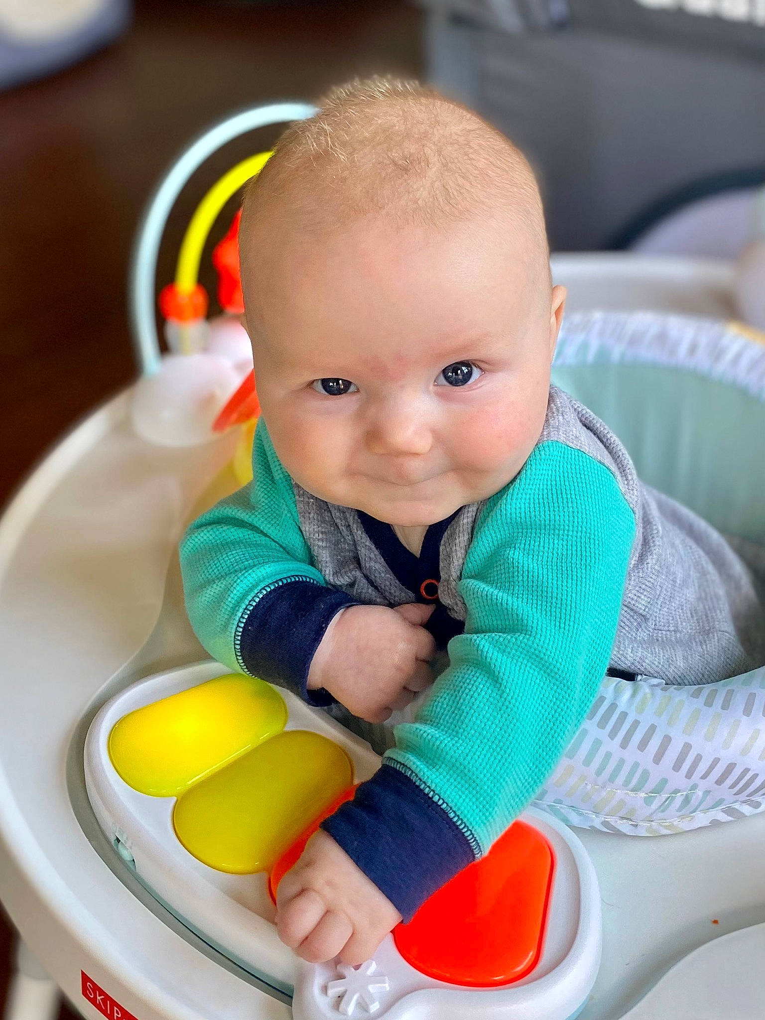 Derek joined the competition — help win amazing prizes! arm, baby, baby_playing_with_toys, baby_products, baby_toddler_clothing, cheek, child, comfort, eye, finger, green, hand, happy, human_body, person, product, skin, smile, toddler, toy