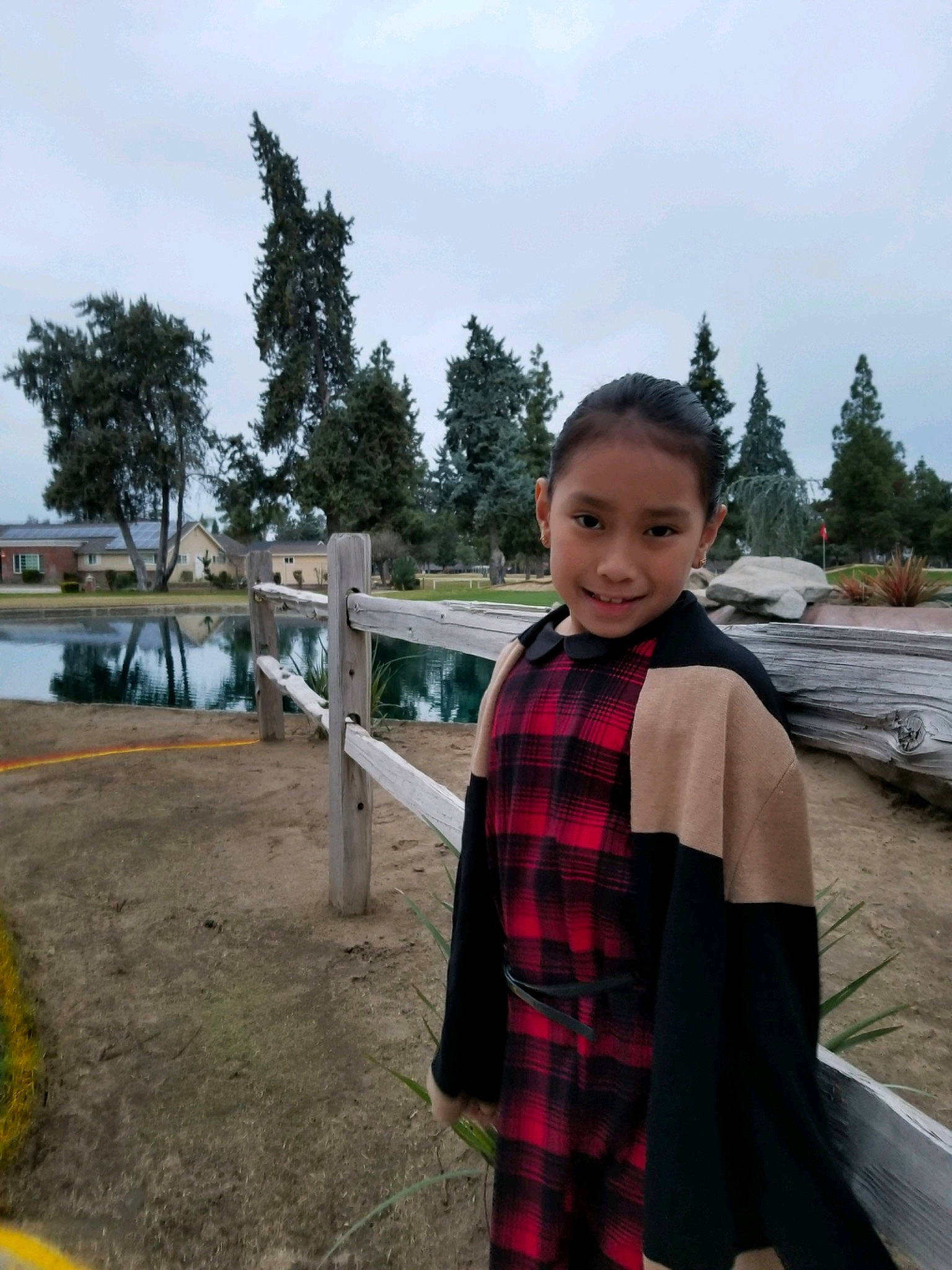 Kairi is registered to the contest to win money with this photo: child, design, joy, outerwear, pattern, person, plaid, tartan, textile, travel