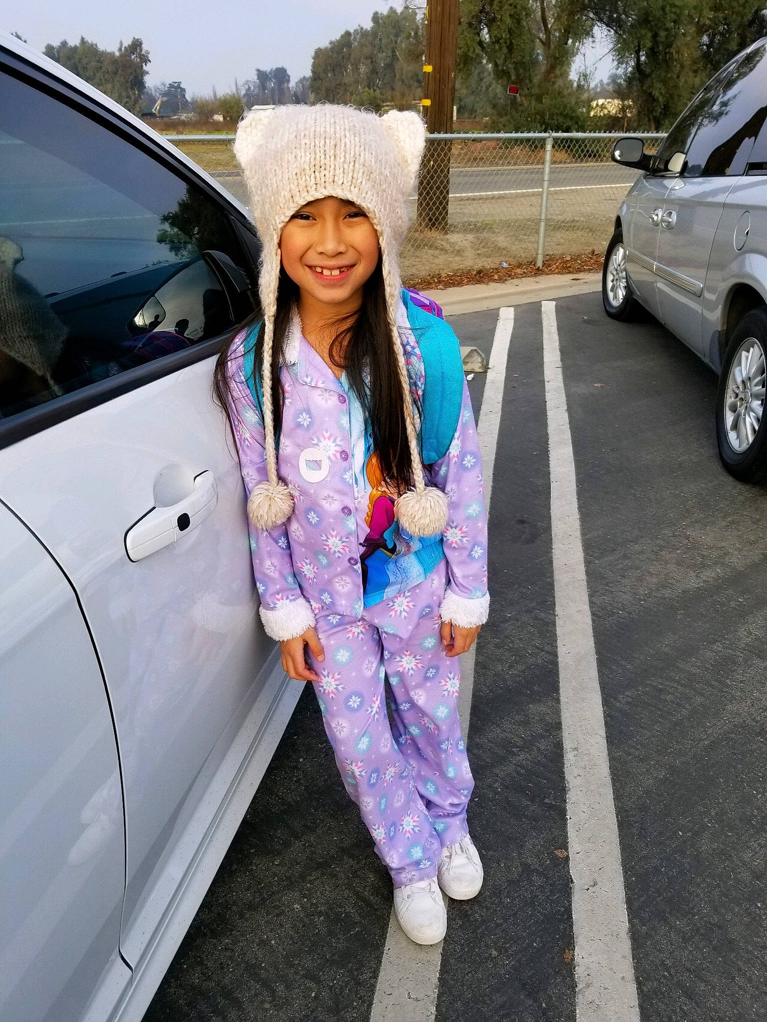 Kairi joined the competition — help win amazing prizes! automotive_window_part, beanie, cap, car, clothing, denim, family_car, fashion, footwear, headgear, jeans, joy, luxury_vehicle, minivan, outerwear, parking, person, photography, plant, street_fashion