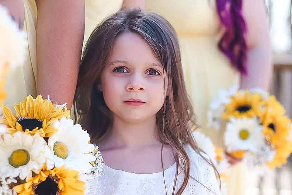 Victoria is registered to the contest to win money with this photo: bouquet, eyelash, facial_expression, fashion, flash_photography, flower, flower_arranging, hair, hairstyle, happy, iris, long_hair, people, person, petal, photograph, plant, skin, summer, textile