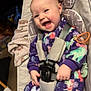 Brooklin joined the competition — help win amazing prizes! baby, smiling, infant, onesie, purple_clothing, dinosaur_pattern, baby_seat, seatbelt, pacifier, blanket, indoor, happy, child, cute, cozy, soft_fabric, infant_toys, child_seat, baby_hands, portrait