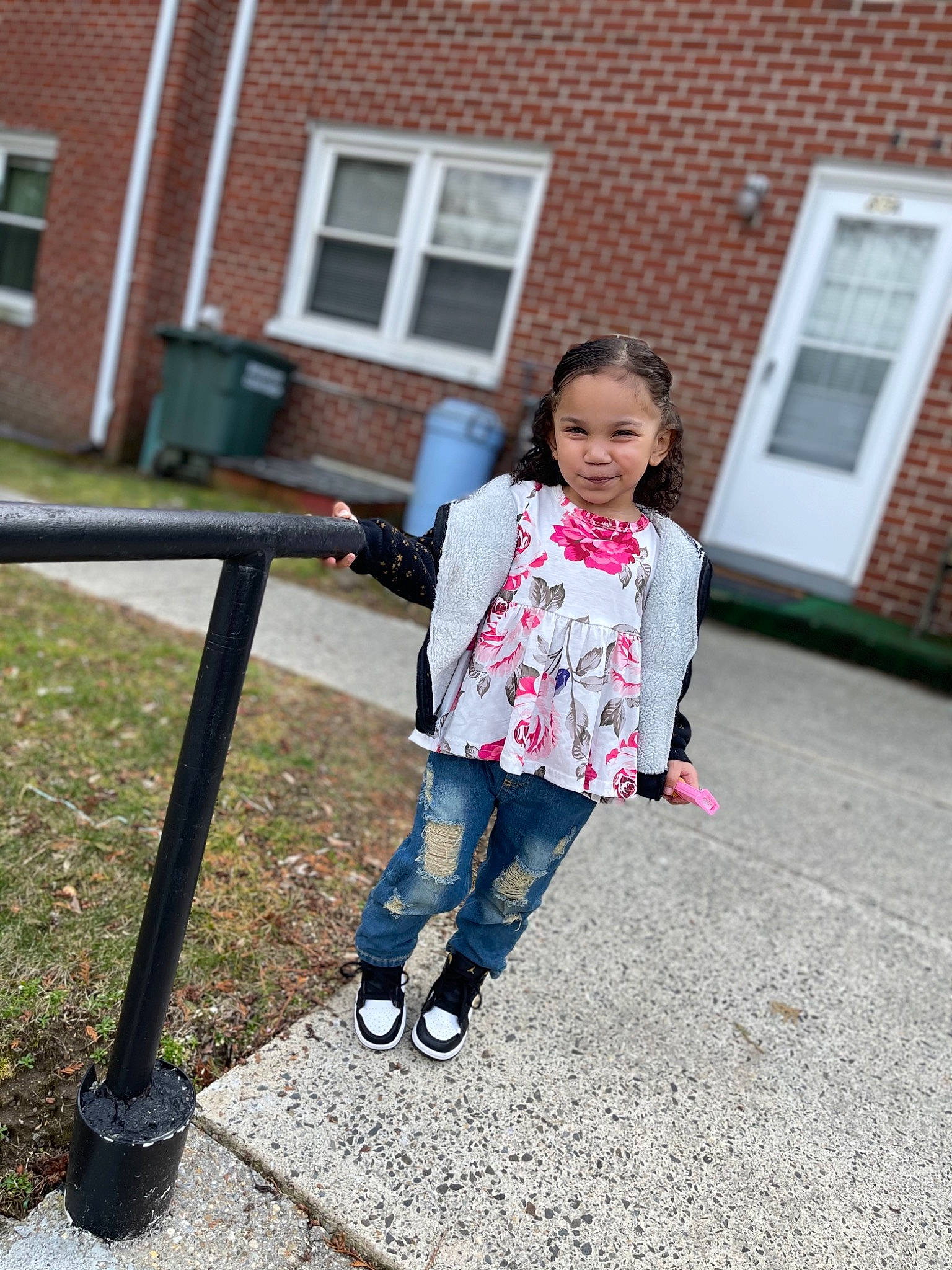 Alaiya is registered to the contest to win money with this photo: asphalt, building, child, city, denim, face, grass, house, jacket, jeans, joy, leisure, person, plant, recreation, shoe, sleeve, sneakers, street_fashion, toddler