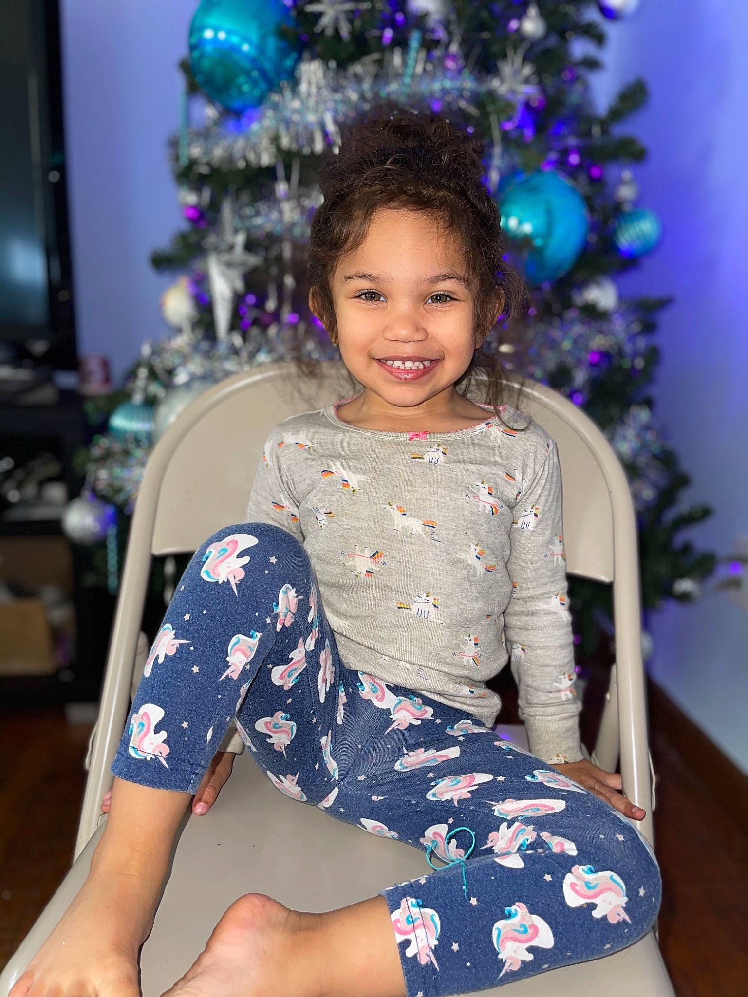 Alaiya is registered to the contest to win money with this photo: beauty, blue, christmas_decoration, christmas_ornament, christmas_tree, dress, electric_blue, fashion, fun, hair, hairstyle, happy, head, joy, knee, person, photograph, purple, sleeve, smile
