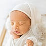 Isaac participe au concours pour gagner de l'argent avec cette photo : newborn, baby, sleeping, blanket, white, knit_hat, soft_texture, fluffy, portrait, peaceful, closeup, infant, wrapped, resting, cute, child, baby_bed, warm, cozy, gentle