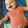 Levi joined the competition — help win amazing prizes! baby, smiling, infant, cactus_pattern, orange_shirt, blue_mat, green_mat, carpet, happy, lying_down, child, cute, portrait, indoors, clothing, person, head, face, skin, baby_fashion