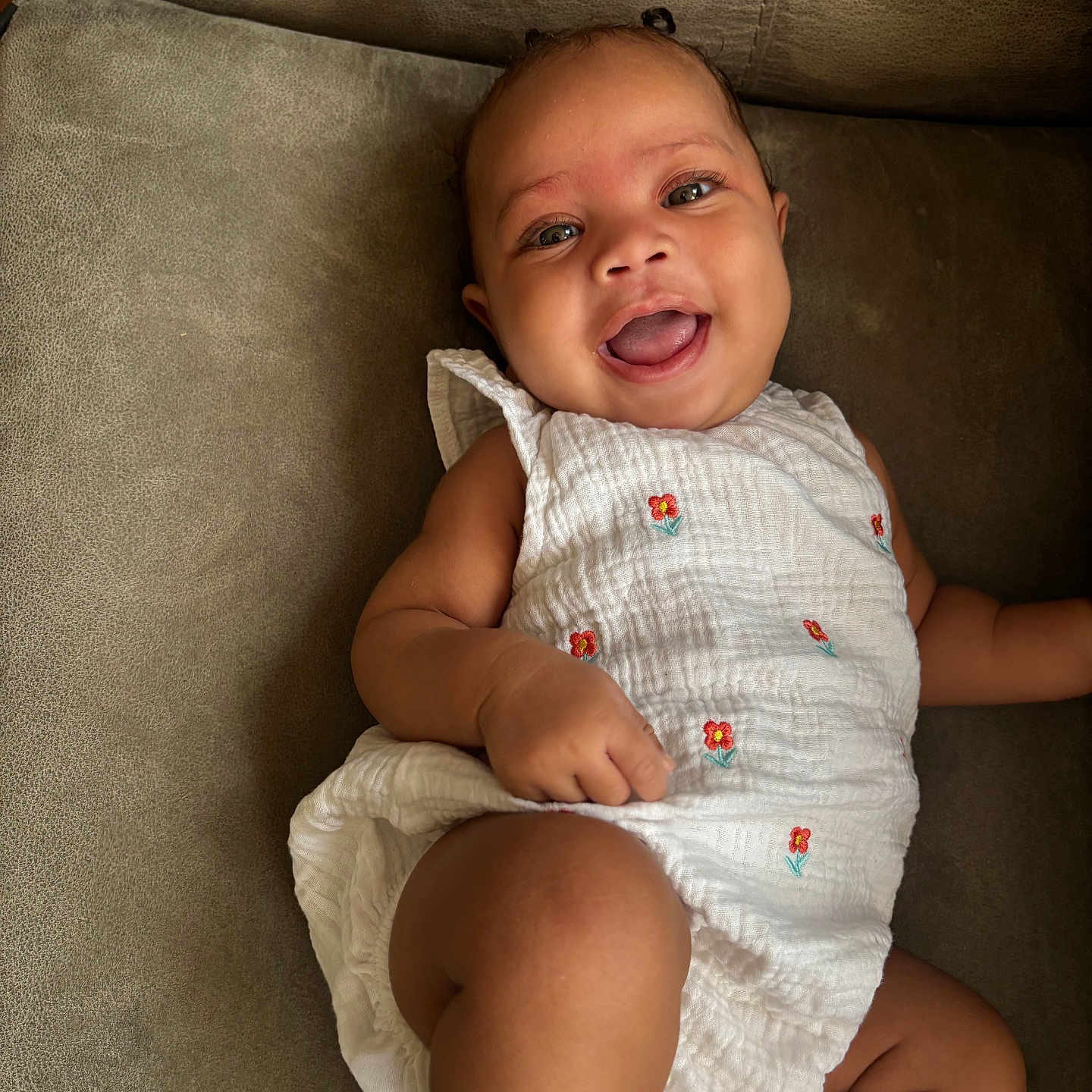 Chancess is registered to the contest to win money with this photo: baby, babylaughing, chair, clothing, couch, cushion, diaper, face, furniture, happy, hat, head, homedecor, laughing, newborn, person, photography, portrait, sitting, smile