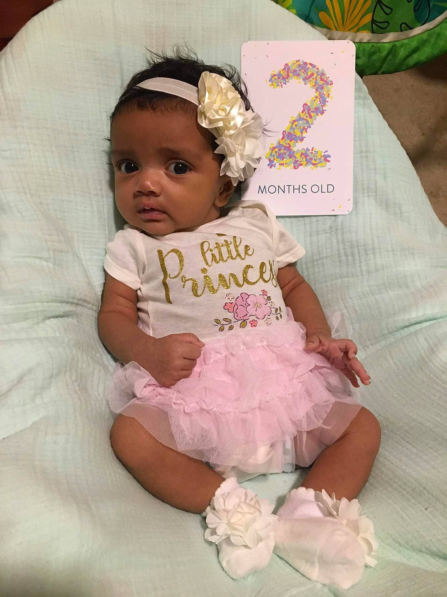 Elyse joined the competition — help win amazing prizes! baby, baby_products, baby_toddler_clothing, cheek, child, comfort, day_dress, dress, event, fashion_accessory, hair_accessory, happy, headband, headpiece, pattern, person, pink, skin, sleeve, textile