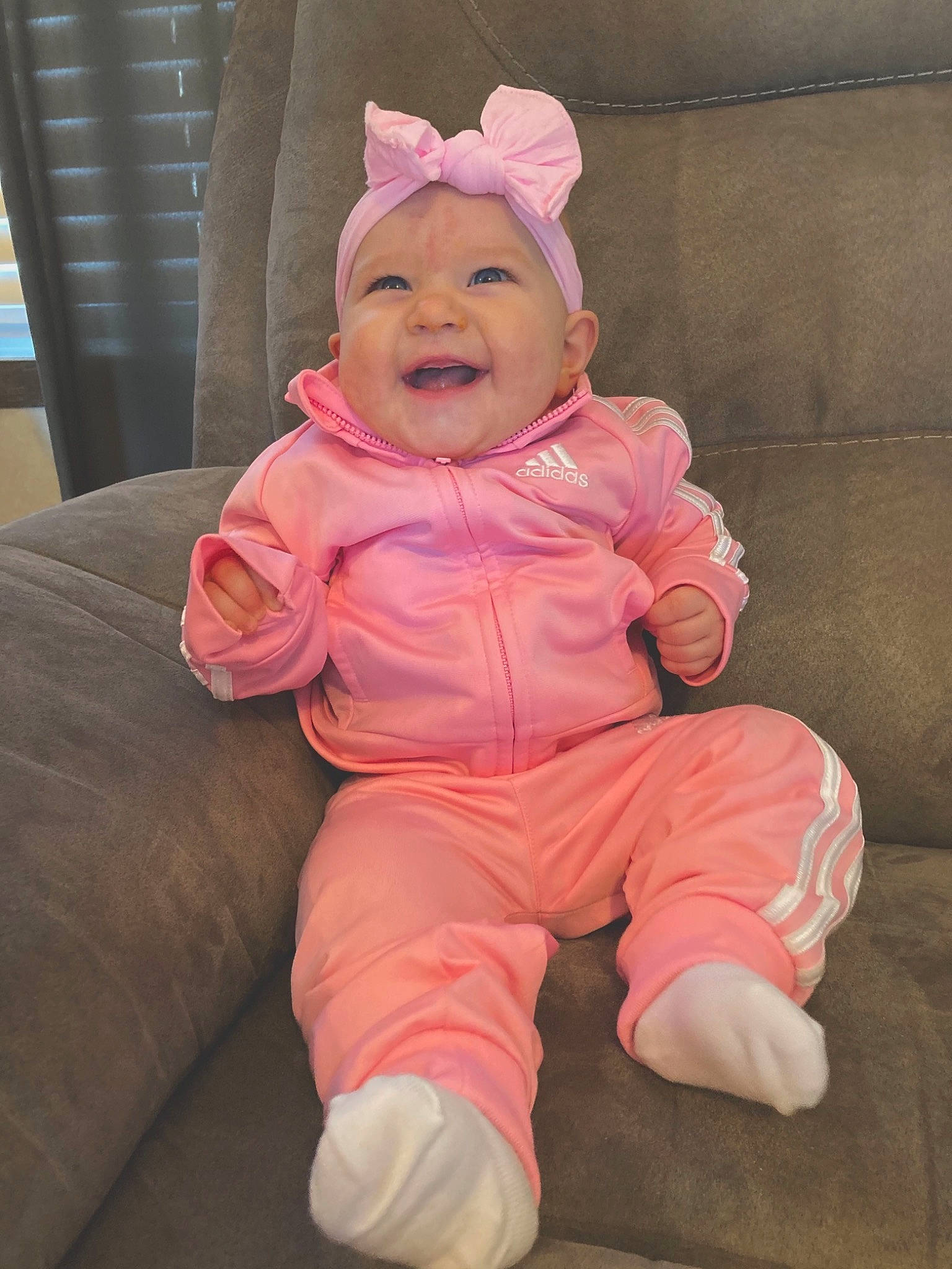 Dreux joined the competition — help win amazing prizes! arm, baby, baby_toddler_clothing, cap, cheek, comfort, fictional_character, flooring, foot, fun, happy, headgear, headwear, human_body, lap, magenta, nose, person, pink, sleeve