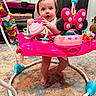 baby, indoor, activity_jumper, pink, toy, child, carpet, footwear, furniture, face, person, play, colorful, smile, happy, legs, hair, room, home, childcare
