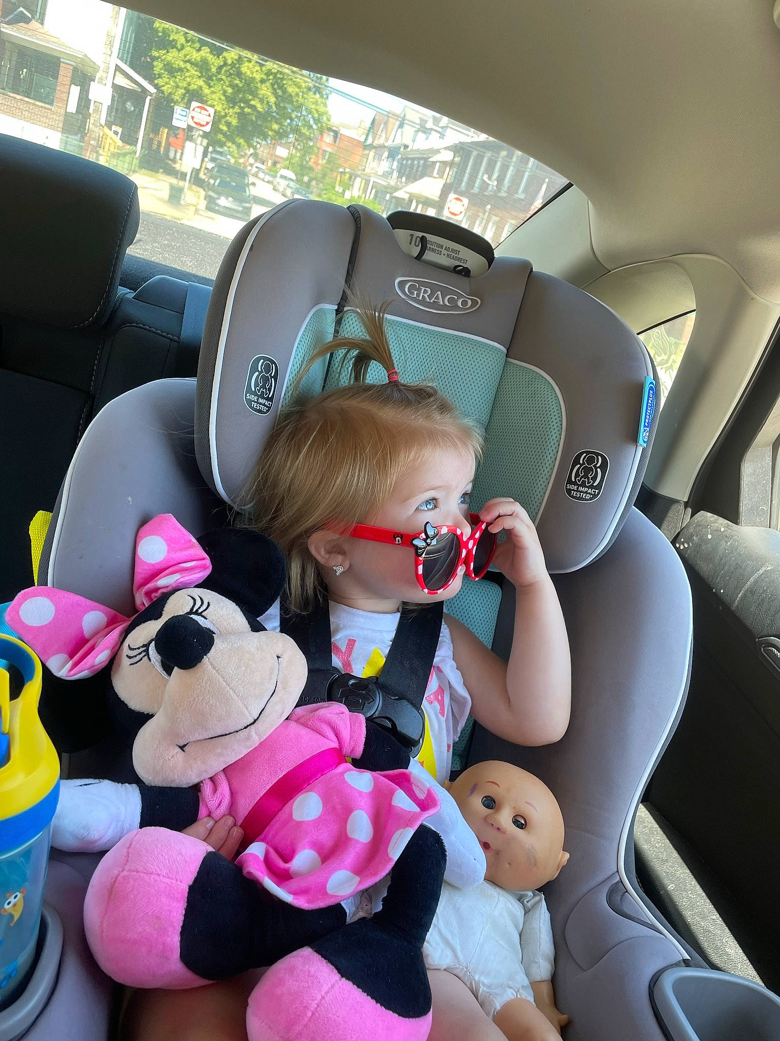 Avalynn is registered to the contest to win money with this photo: auto_part, automotive_design, car, car_seat, car_seat_cover, comfort, eyewear, family_car, goggles, head_restraint, motor_vehicle, person, personal_luxury_car, seat_belt, steering_part, steering_wheel, sunglasses, toddler, vehicle, vehicle_door