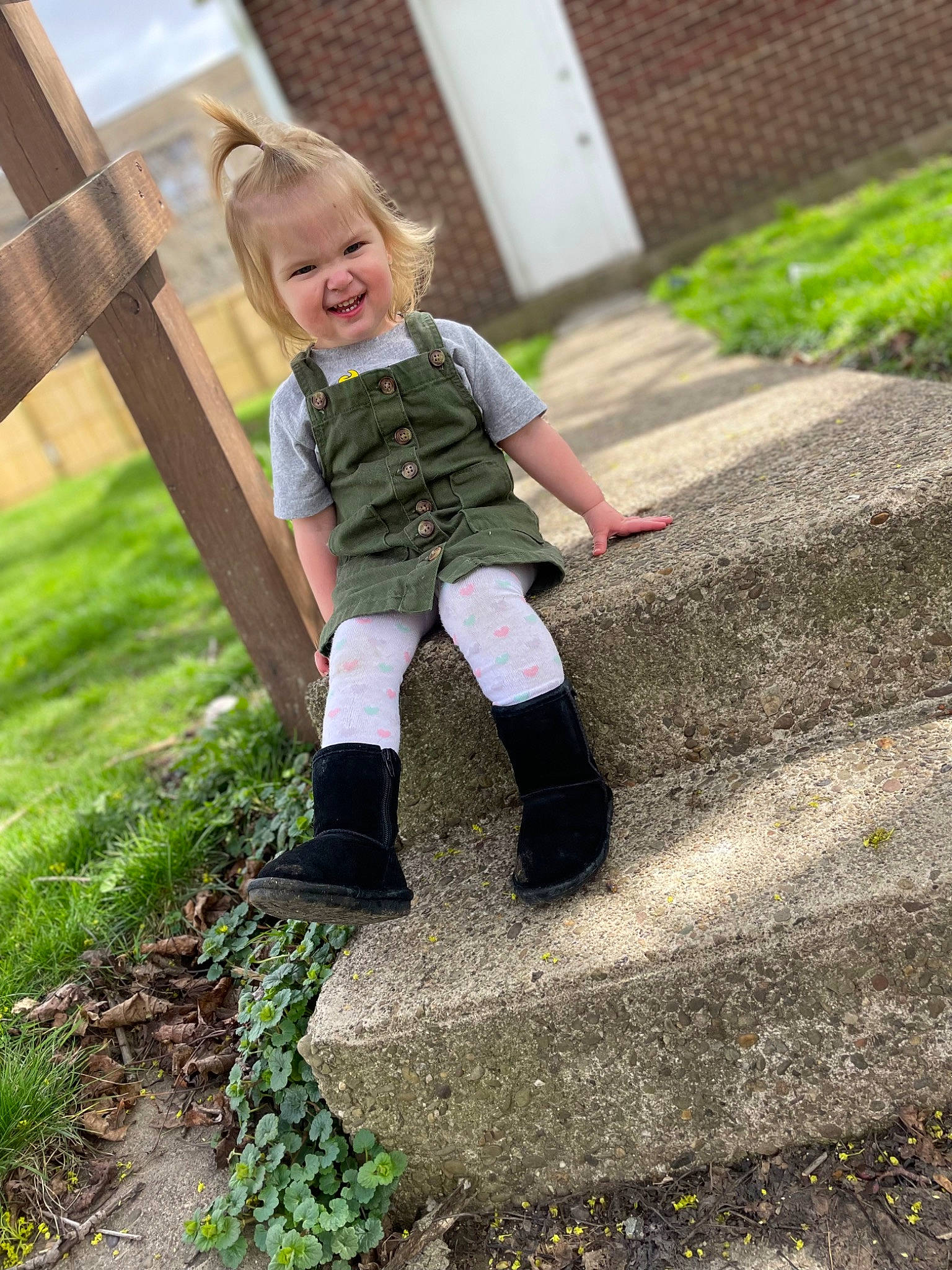 Avalynn joined the competition — help win amazing prizes! asphalt, blond, boot, eye, fun, grass, happy, head, human_leg, knee, leisure, people_in_nature, person, plant, smile, sneakers, sock, t_shirt, thigh, toddler