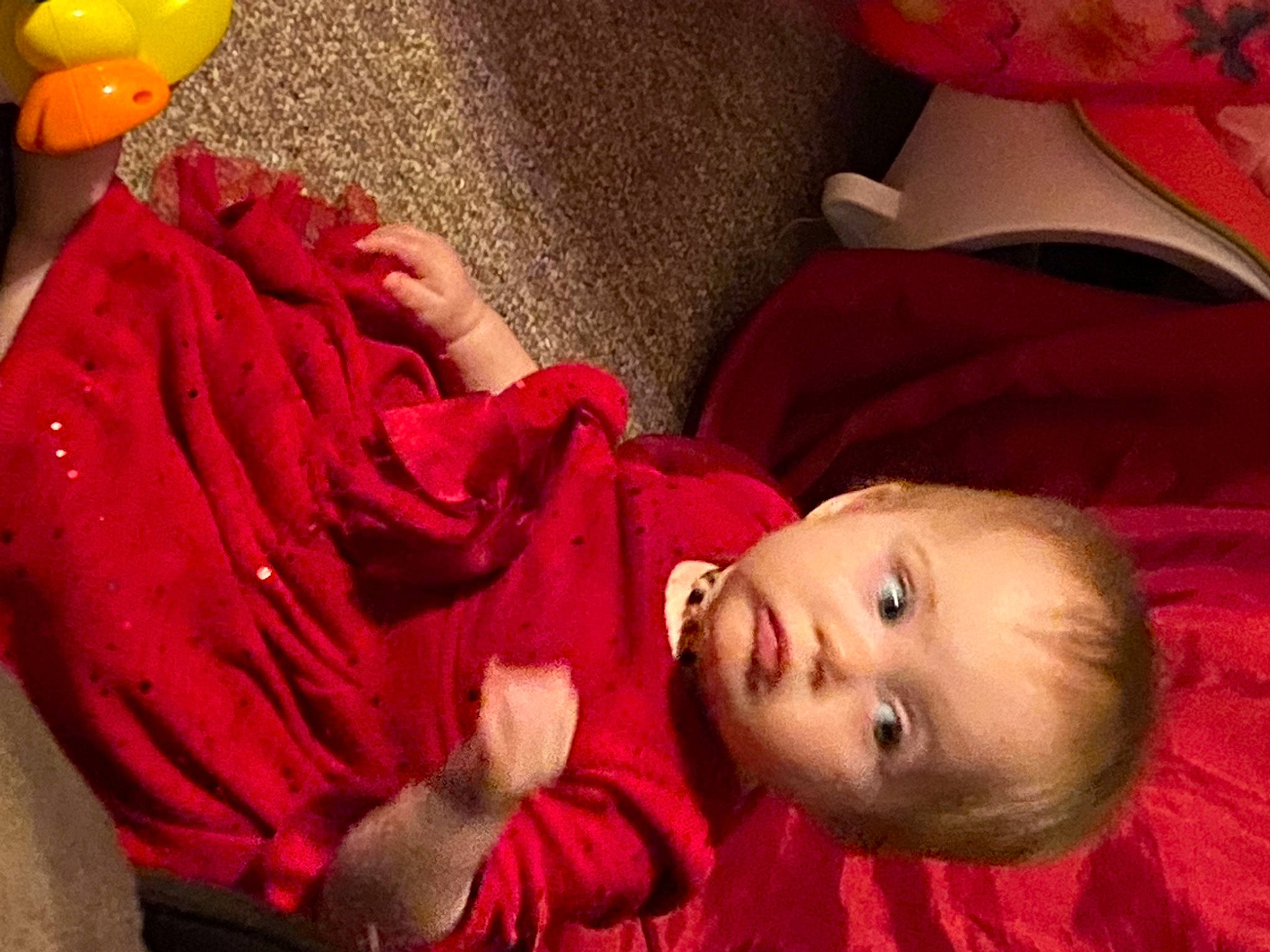 Ivy is registered to the contest to win money with this photo: baby, baby_toddler_clothing, bag, balloon, cheek, child, comfort, eye, flooring, fur, happy, linens, lip, magenta, nose, person, pink, red, skin, toddler