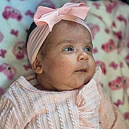 Angelica joined the competition — help win amazing prizes! adorable, baby, blanket, bow, child, closeup, cute, expression, face, floral, headband, indoors, infant, knitwear, newborn, pink, portrait, skin, sleepwear, soft