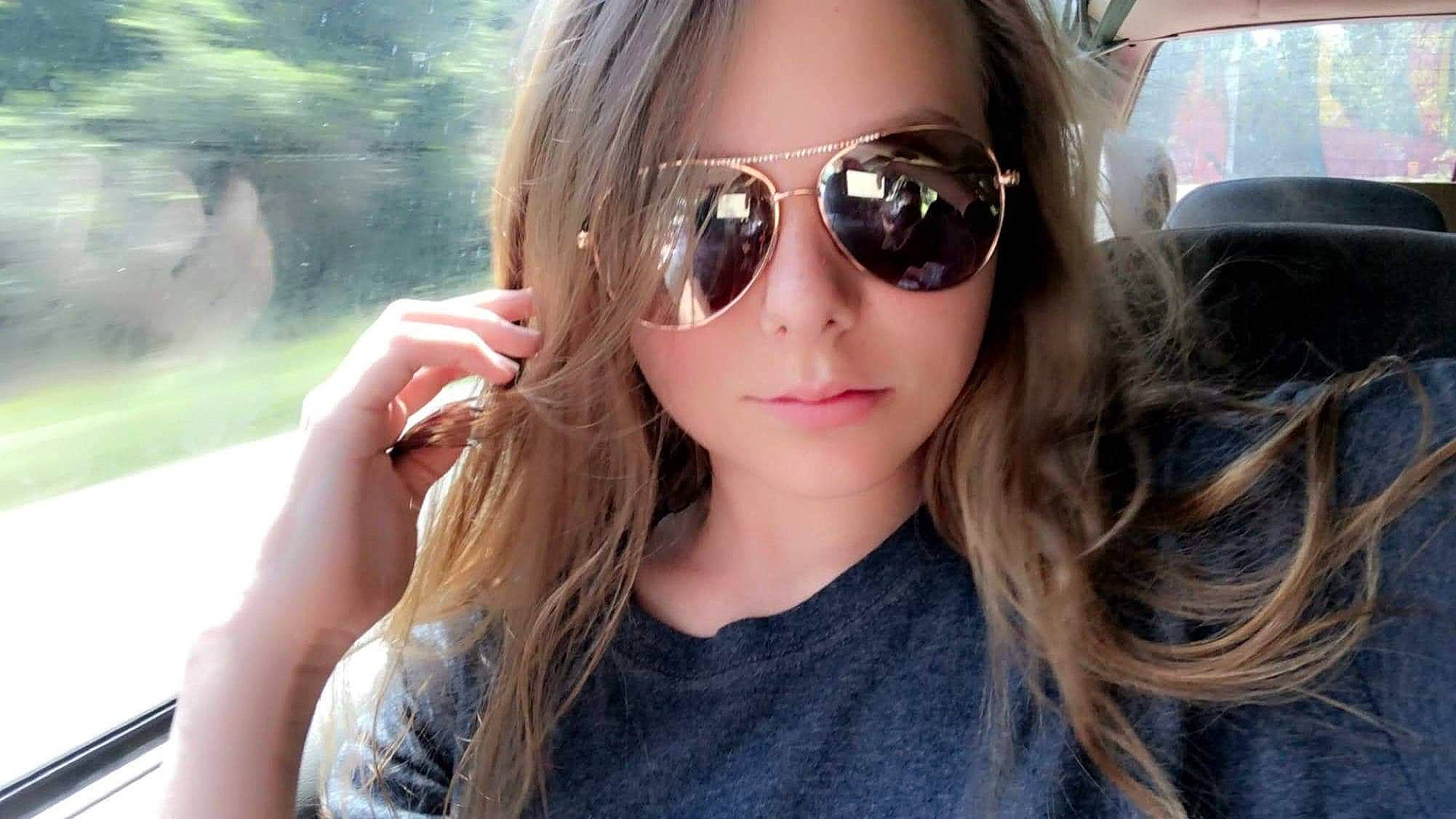 Halie joined the competition — help win amazing prizes! bangs, black_hair, cool, eye_glass_accessory, eyelash, eyewear, fawn, glasses, goggles, happy, layered_hair, lip, long_hair, person, personal_protective_equipment, selfie, step_cutting, sunglasses, tints_and_shades, tree