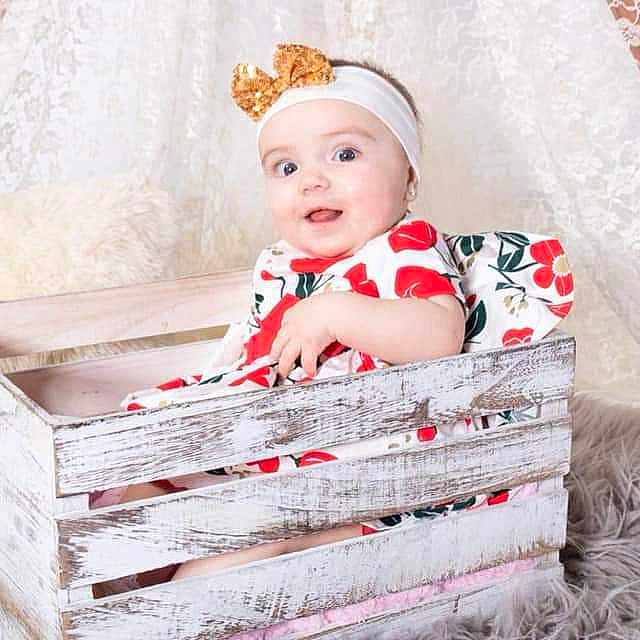 Zylah is registered to the contest to win money with this photo: baby, child, fashion_accessory, furniture, hair_accessory, headgear, person, product, room, toddler, wicker