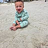 Atlas joined the competition — help win amazing prizes! baby, child, sand, beach, smile, happy, onesie, sitting, outdoor, sky, buildings, palm_trees, toes, clothing, footwear, sunlight, nature, portrait, play, cute