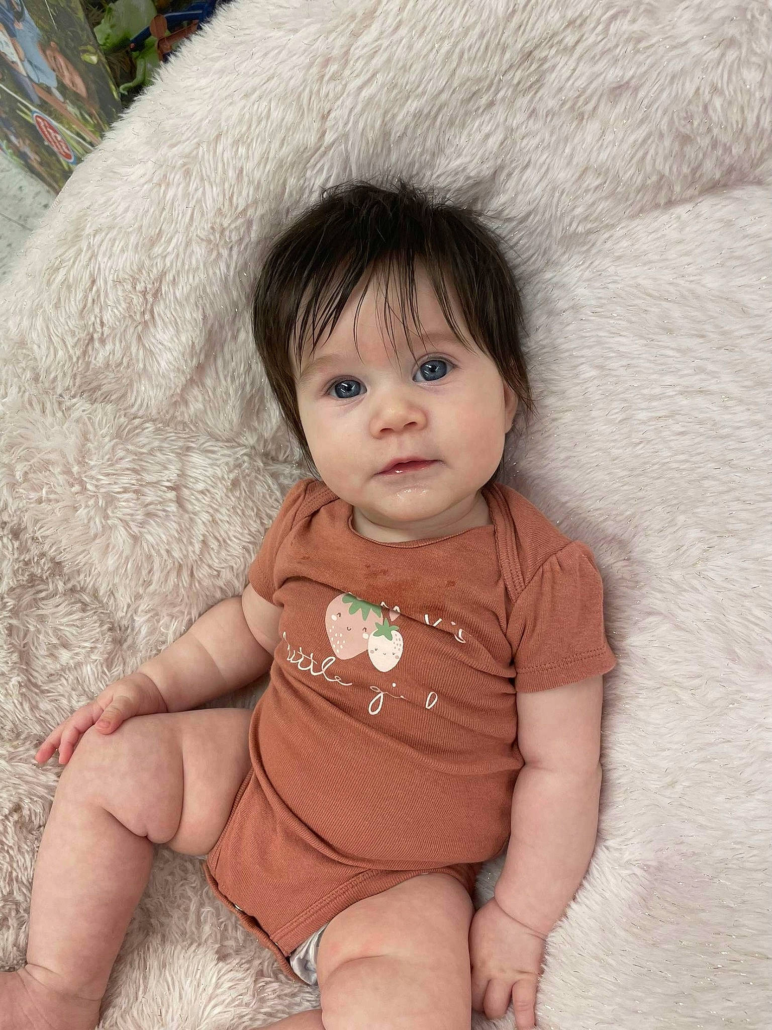 Ivory is registered to the contest to win money with this photo: baby, baby_toddler_clothing, brown_hair, cheek, child, collar, comfort, eyelash, happy, iris, lip, neck, nose, pattern, person, sitting, skin, sleeve, textile, toddler