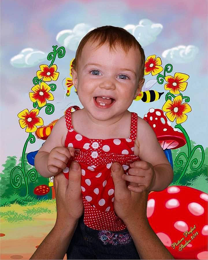 Tieara is registered to the contest to win money with this photo: arm, baby_toddler_clothing, cheek, clothing, cloud, eye, face, facial_expression, finger, gesture, happy, head, human, joy, orange, people_in_nature, person, pink, product, skin