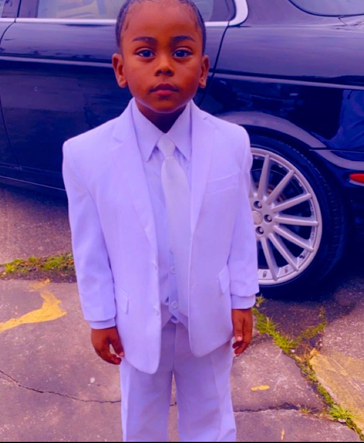 Daylan is registered to the contest to win money with this photo: asphalt, automotive_design, automotive_exterior, automotive_lighting, automotive_tire, blazer, blue, car, cool, dress_shirt, electric_blue, land_vehicle, person, photograph, street_fashion, suit, tie, tire, vehicle, vehicle_door