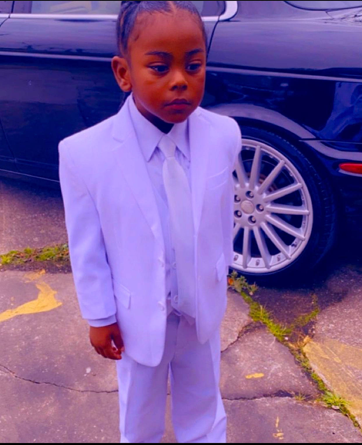 Daylan is registered to the contest to win money with this photo: asphalt, automotive_design, automotive_exterior, automotive_lighting, automotive_tire, blazer, blue, car, cool, dress_shirt, electric_blue, formal_wear, land_vehicle, person, street_fashion, suit, tie, tire, vehicle, vehicle_door