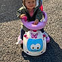 Solyanna participe au concours pour gagner de l'argent avec cette photo : toddler, child, toy_car, outdoor, asphalt, sunlight, pink_bows, jacket, shoes, play, cute, smile, vehicle, small, happy, childhood, fun, daylight, casual, person