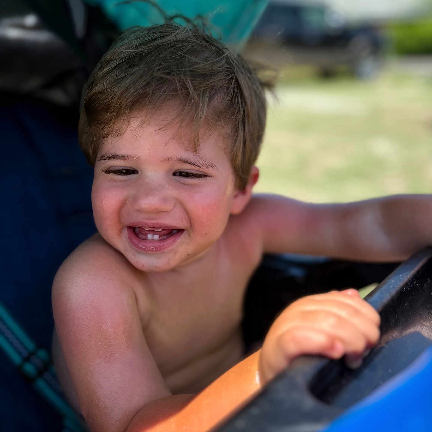 Waylon joined the competition — help win amazing prizes! baby_teeth, bare_chest, blurry_background, cheerful, child, closeup, cute, fun, hair, hand, happy, outdoor, play, portrait, skin, smiling, summer, sunlight, toddler, young_child