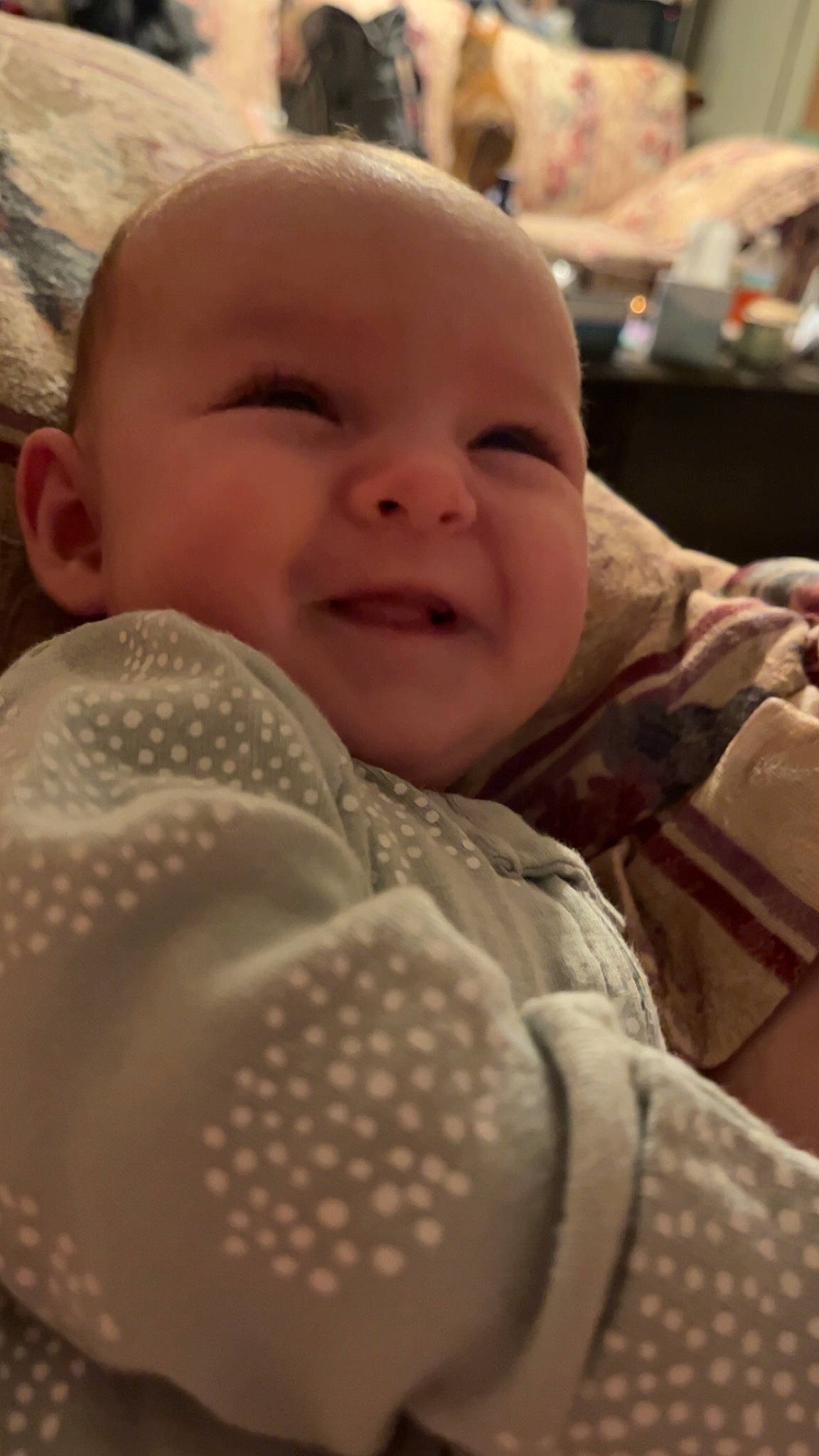 Rya is registered to the contest to win money with this photo: baby, baby_toddler_clothing, cheek, child, chin, comfort, fun, happy, human, iris, lip, mammal, mouth, nose, pattern, person, product, room, skin, smile