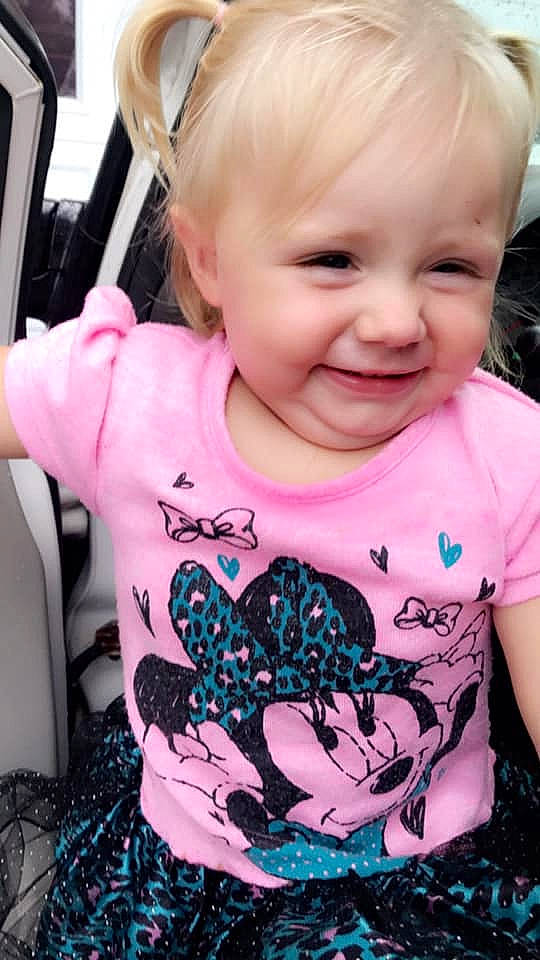 Lydai is registered to the contest to win money with this photo: baby, baby_products, baby_toddler_clothing, car_seat, cheek, child, cool, ear, face, head, iris, joy, lip, neck, person, pink, plant, sleeve, smile, toddler