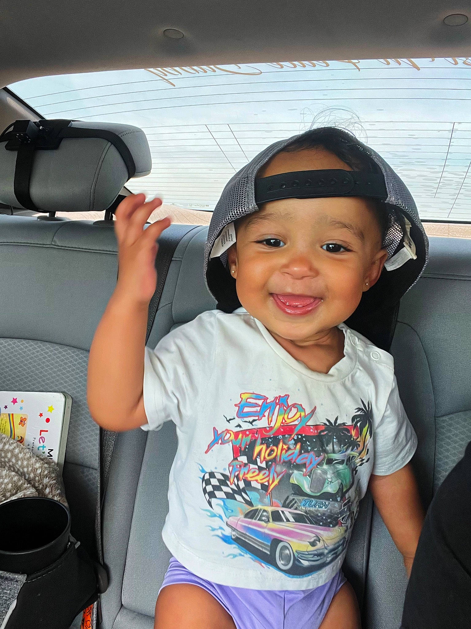 Tinsley joined the competition — help win amazing prizes! auto_part, automotive_design, automotive_exterior, car_seat, car_seat_cover, cool, family_car, happy, head_restraint, headwear, joy, leisure, motor_vehicle, person, smile, steering_wheel, t_shirt, thigh, toddler, travel
