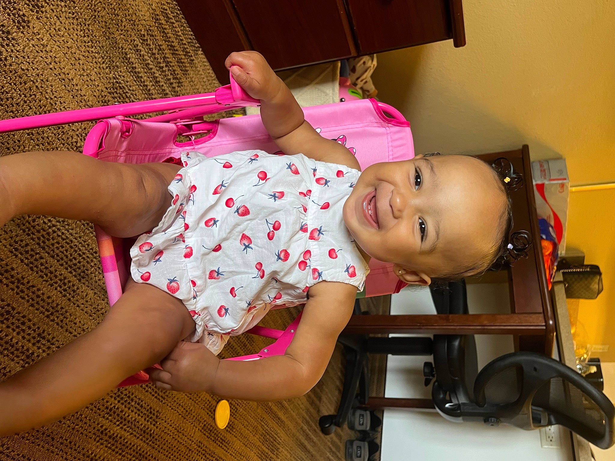 Tinsley is registered to the contest to win money with this photo: baby, baby_toddler_clothing, child, clothing, finger, fun, hand, happy, human_body, human_leg, joint, joy, leg, magenta, mouth, person, pink, purple, skin, smile