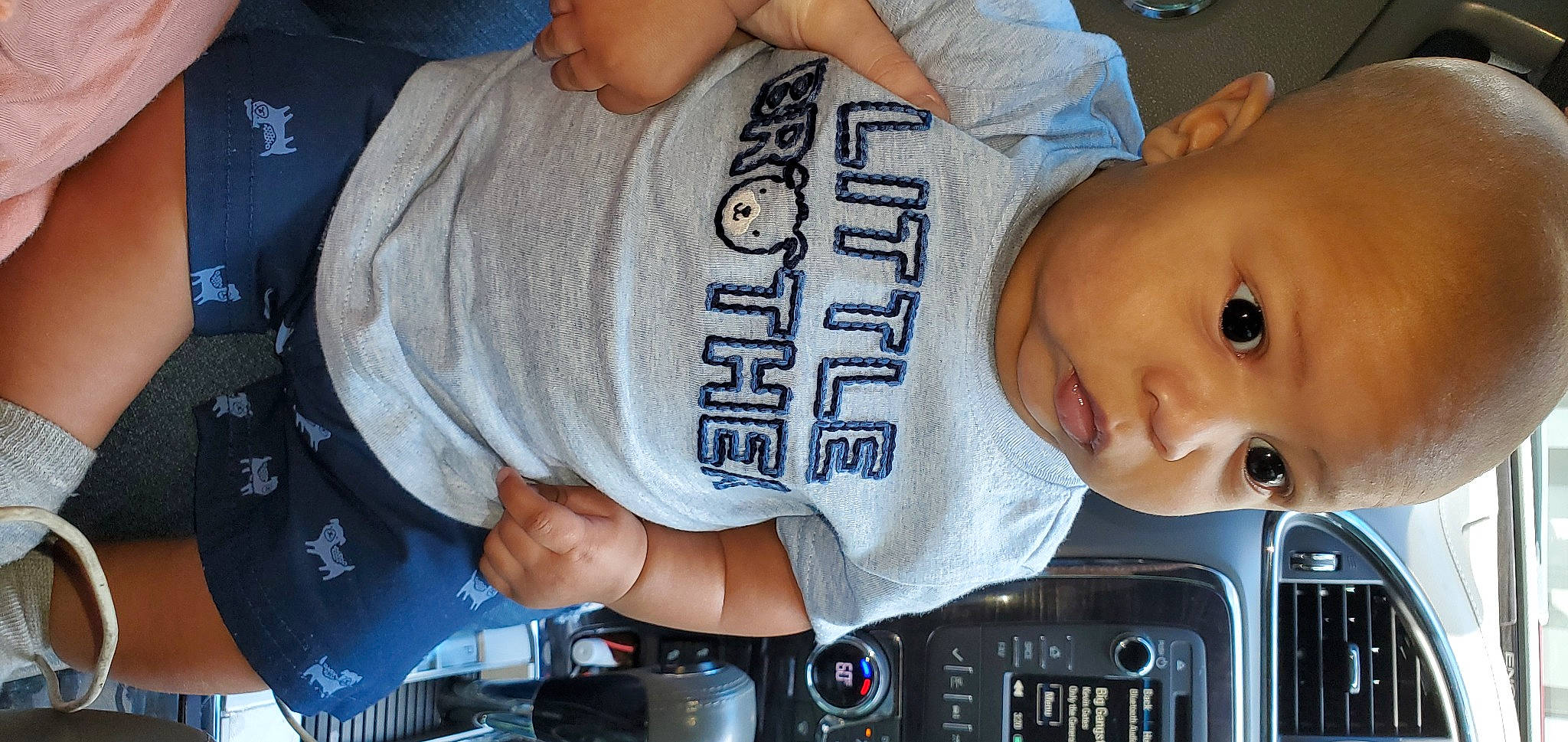 Kadyn joined the competition — help win amazing prizes! audio_equipment, baby, baby_products, baby_toddler_clothing, cheek, chest, child, elbow, eyelash, finger, fun, mouth, muscle, person, product, sleeve, smile, t_shirt, thumb, toddler