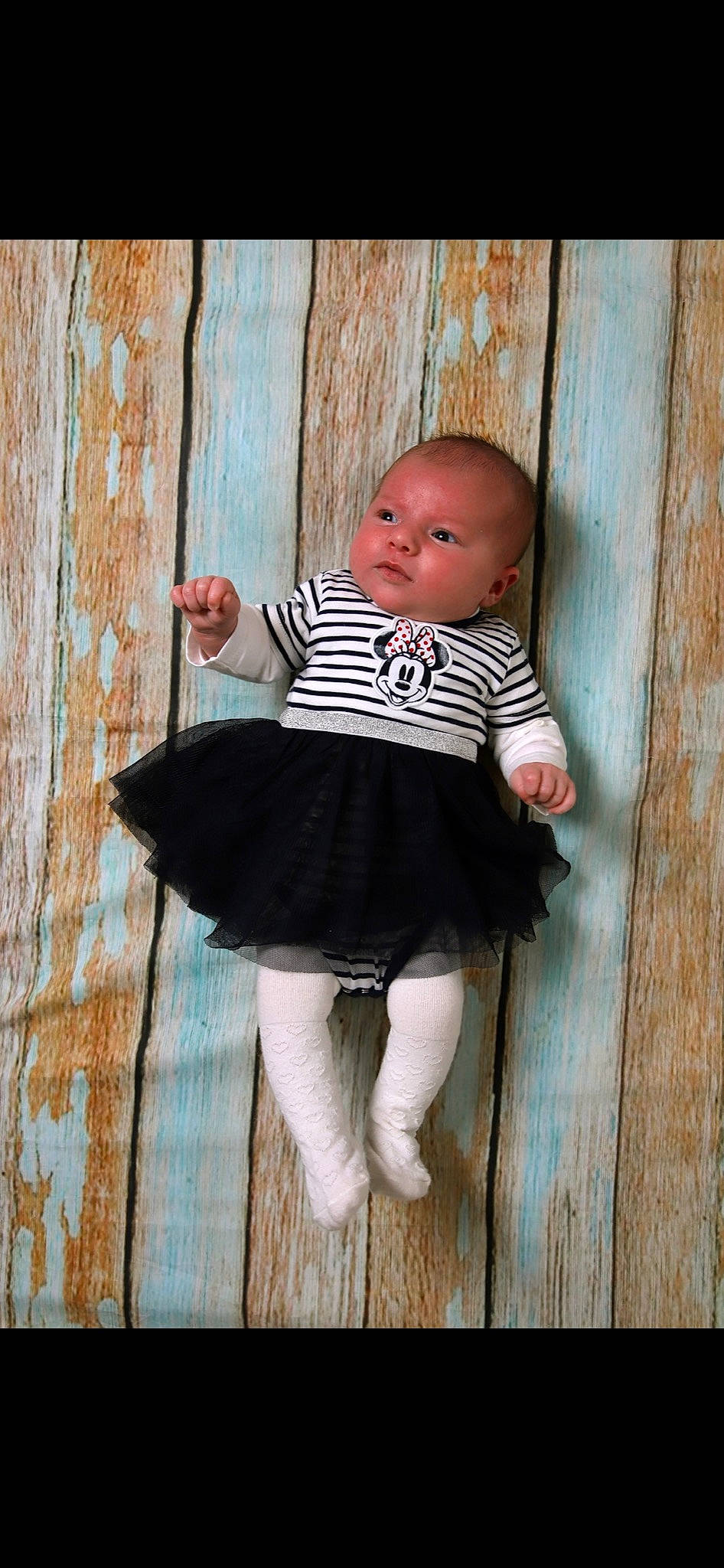 Romy a rejoint le concours — aidez-le/la à gagner de superbes lots ! baby, baby_toddler_clothing, child, doll, fashion_accessory, fur, headgear, human_body, joint, knee, pattern, pink, sitting, sleeve, sock, textile, toddler, toy, wood, wool