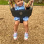 toddler, child, swing, playground, smiling, denim_overalls, striped_shirt, shoes, socks, wood_chips, trees, outdoor, happy, fun, play, daylight, park, young_child, baby, person