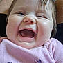 baby, child, smiling, laughing, pink_shirt, cute, face, indoor, happy, closeup, infant, young_child, human, portrait, cheeks, joy, expression, clothing, sitting, skin