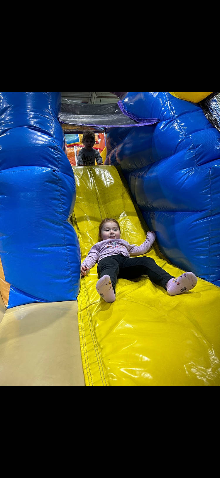 Myah joined the competition — help win amazing prizes! blue, child, chute, comfort, electric_blue, fun, games, inflatable, leisure, outdoor_play_equipment, outdoor_recreation, person, play, playground, product, recreation, shorts, smile, t_shirt, toddler