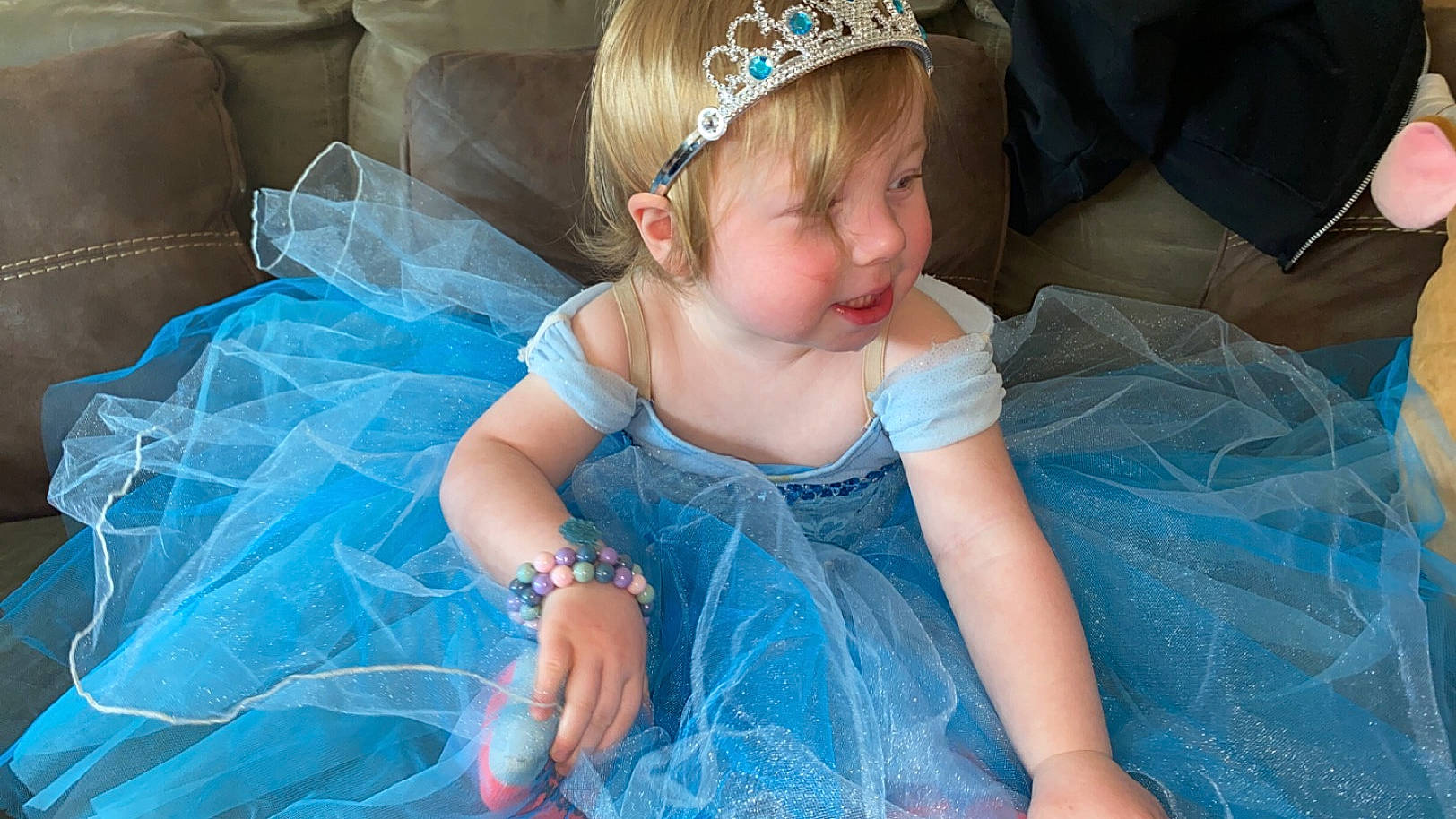Tamra is registered to the contest to win money with this photo: aqua, azure, baby_toddler_clothing, beauty, child, clothing, dress, electric_blue, event, fun, grass, happy, headband, headpiece, iris, jewellery, person, pink, purple, smile