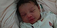 Hawa participe au concours pour gagner de l'argent avec cette photo : baby, blanket, child, closeup, clothing, comfort, cozy, cute, face, hand, indoors, infant, newborn, peaceful, person, portrait, resting, sleeping, soft, warm