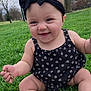 baby, infant, child, smile, grass, headband, bow, park, outdoor, sitting, onesie, chubby_legs, hand, face, portrait, happy, candid, green_grass, trees, cute