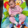 Eliana is registered to the contest to win money with this photo: baby, sleeping, pink_pajamas, child, baby_chair, colorful, animal_print, indoor, cute, peaceful, infant, socks, seat_belt, nursery, toddler, resting, soft_lighting, carpet, portrait, young_child